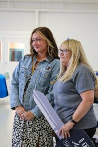 A woman who received a car , Allstate Insurance representatives and G&C Auto Representatives